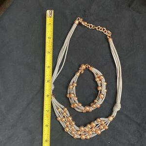 Gray leather set with rose tone beads
